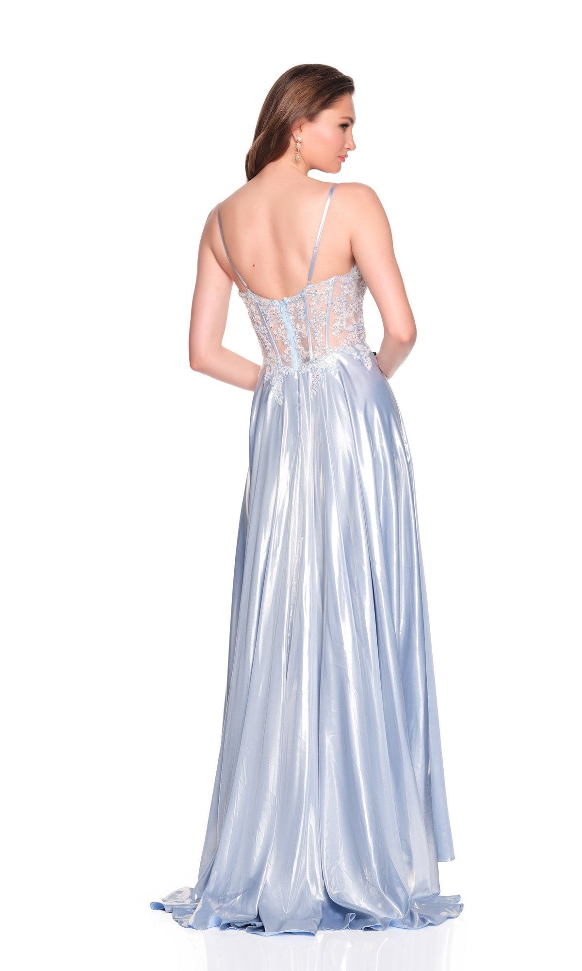 A woman in the Dave and Johnny 12631 long prom dress, light blue with a sleeveless embroidered corset bodice and sheer lace back, stands against a white background facing away from the camera.